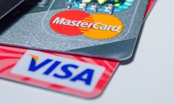 Visa ve Mastercard, ATM ücreti davası için 197,5 milyon dolar ödeyecek