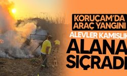 Koruçam’da park halindeki araç yandı: Alevler kamışlık alana sıçradı