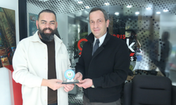 Sivil Savunma’dan Kıbrıs Gerçek’e Ziyaret: Şahbaz’dan Yüksel’e Plaket