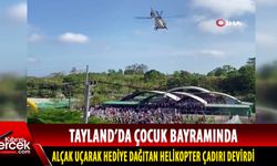 Tayland'da Çocuk Bayramı etkinliklerinde alçak uçuş yaparak hediye dağıtan helikopter çadırı devirdi