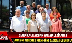 Kıbrıslı Türk ve Rum sendikacılar, Şampiyon Melekleri Yaşatma Derneği'ni ziyaret etti