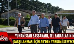 Afet bölgesinde Miçotakis protesto edildi